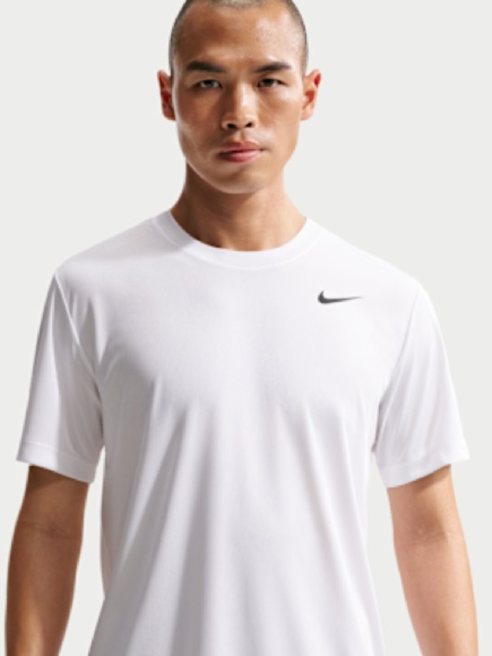 Nike White Short-Sleeve Performance Tee with Black Swoosh